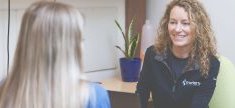 Doctor of Physical Therapy (DPT) consulting with a Cary NC patient